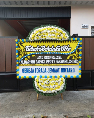 Papan Bunga Duka di Girian Indah